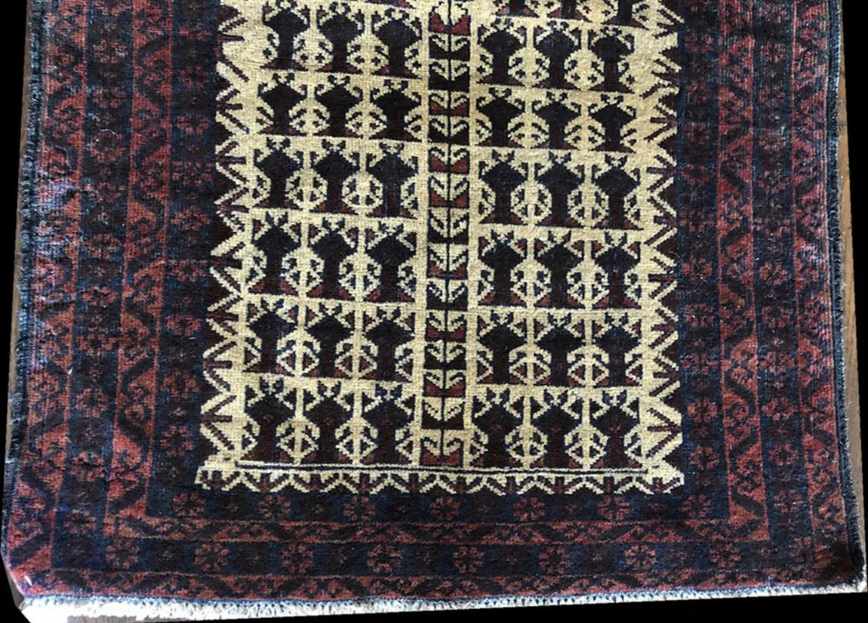 A  Vintage Tribal Prayer Baluch Rug