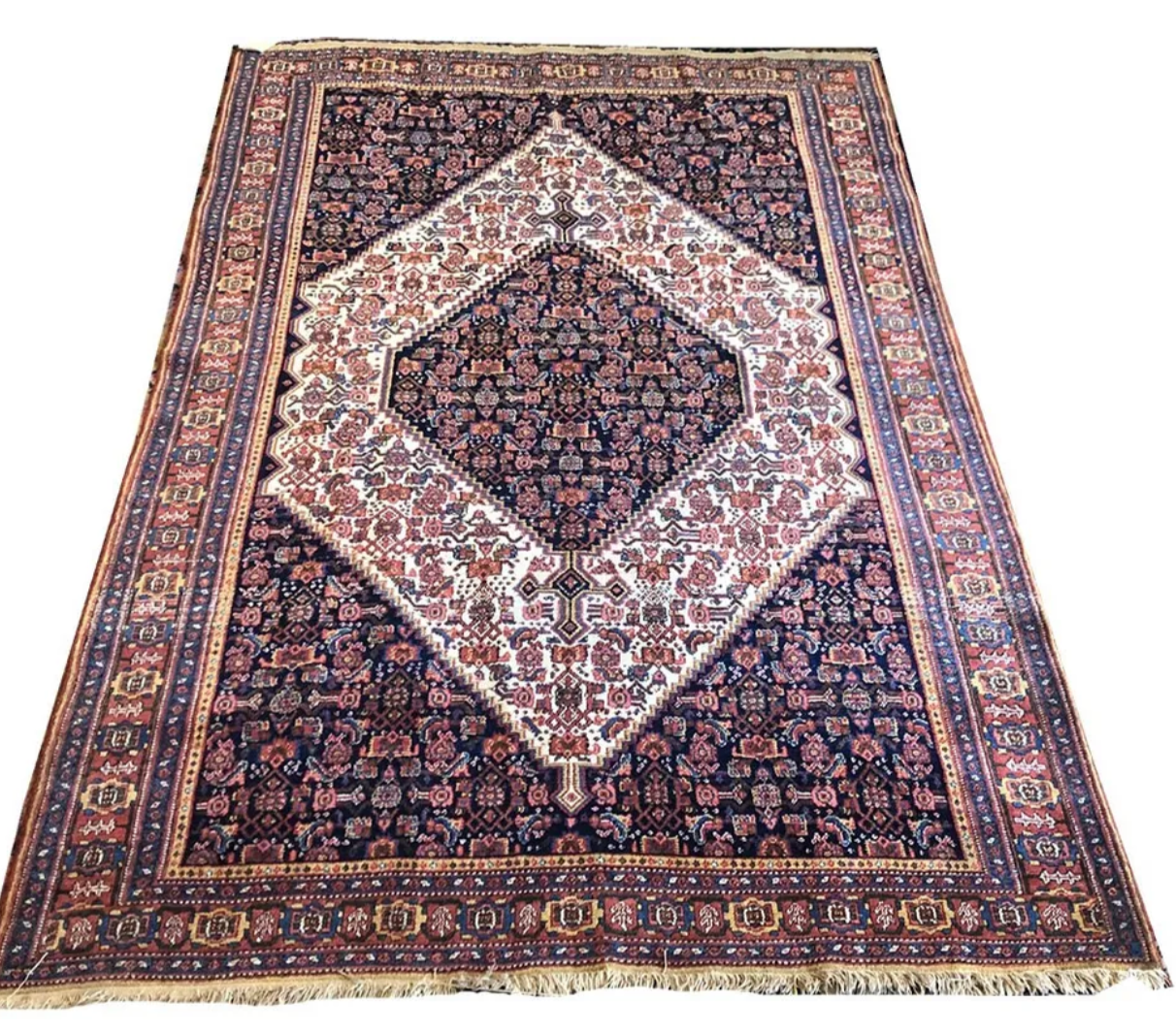 A Brilliant Antique Tribal Persian Seneh Rug