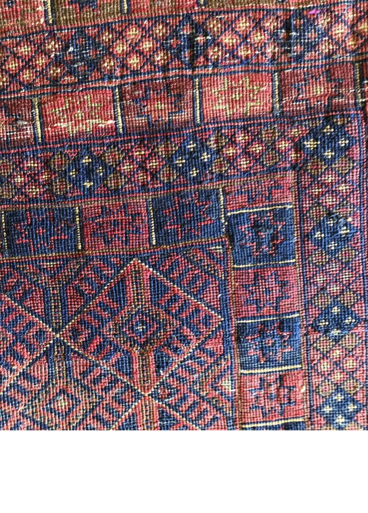 A Vintage Primitive & Tribal Geometric Afghan Rug