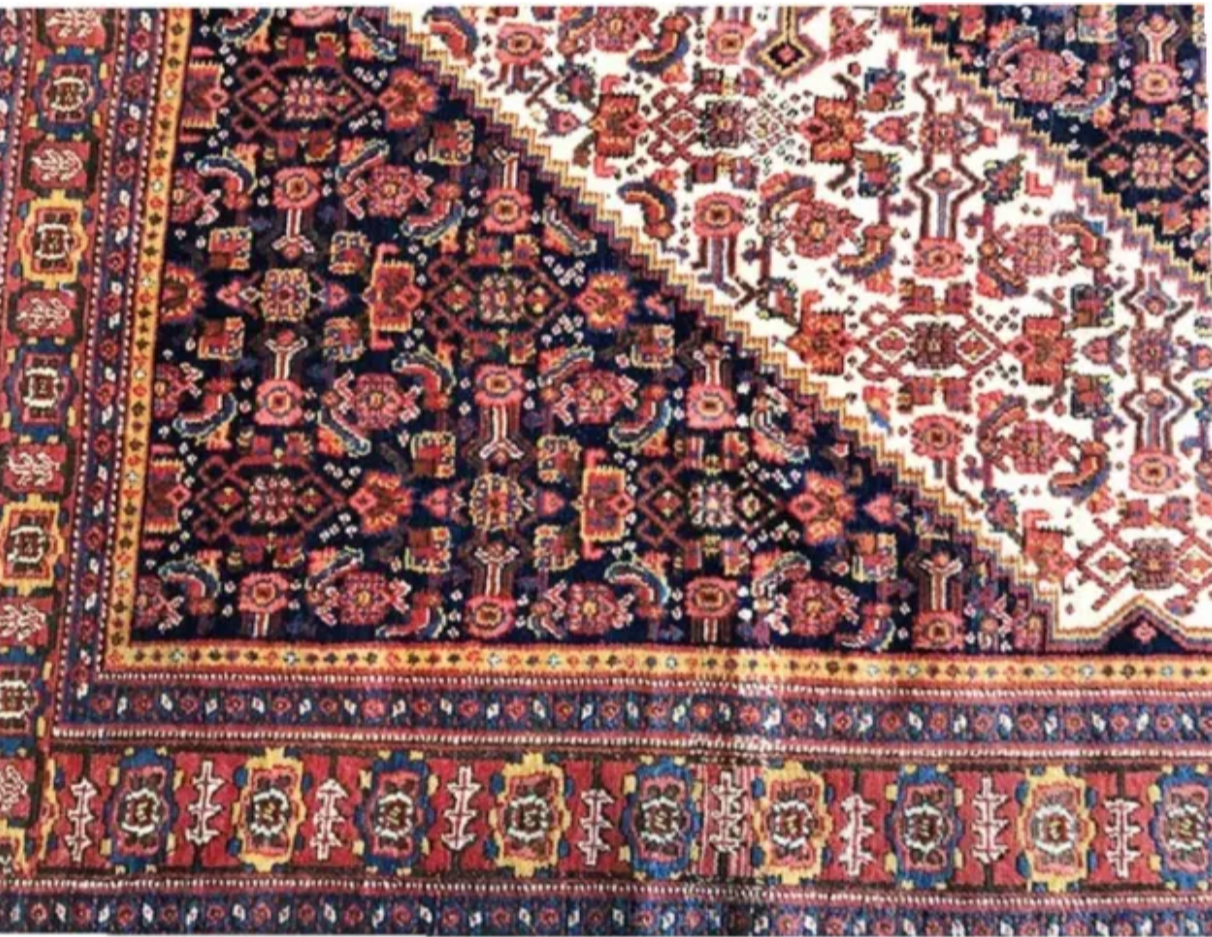 A Brilliant Antique Tribal Persian Seneh Rug