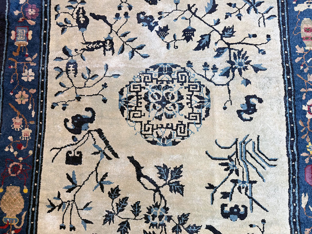 An Antique 5' x 8' Unusual Chinese Peking Rug