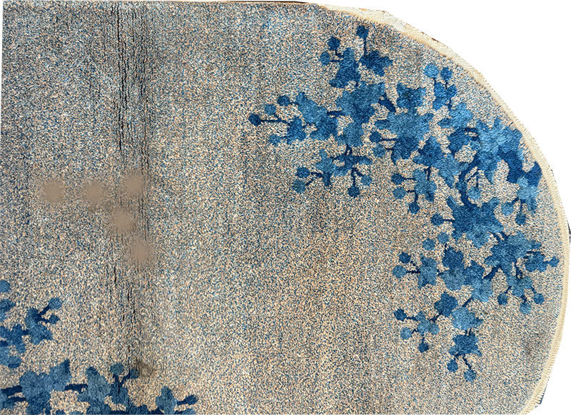 An antique Oval 3' x 6' Art Deco Chinese Rug