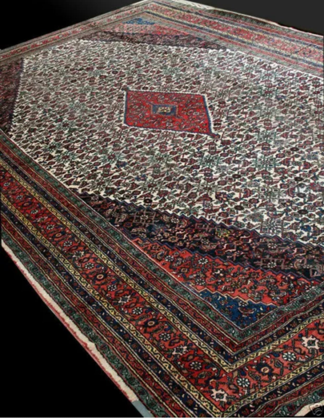 An Antique Palace Size 11’ x 19’ Persian Bibikabad Rug