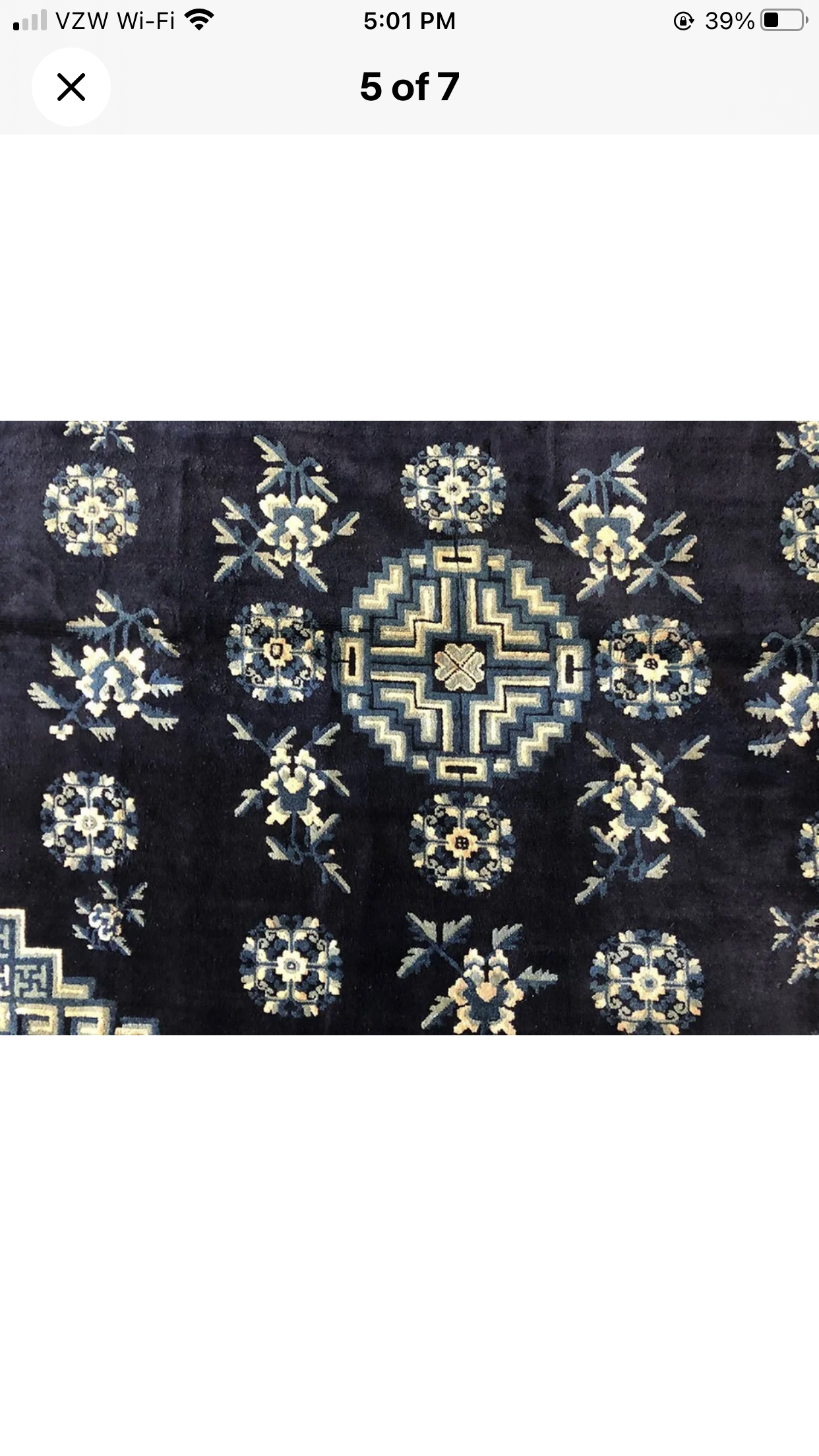 An Antique 6’ x 9’ Chinese Peking Rug “Pao Tao”
