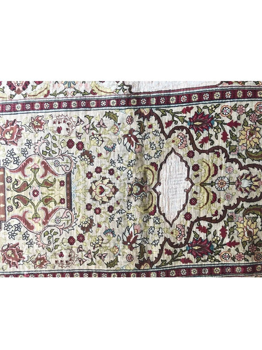 A Vintage Turkish Silk Hereke Rug With Metal Threds