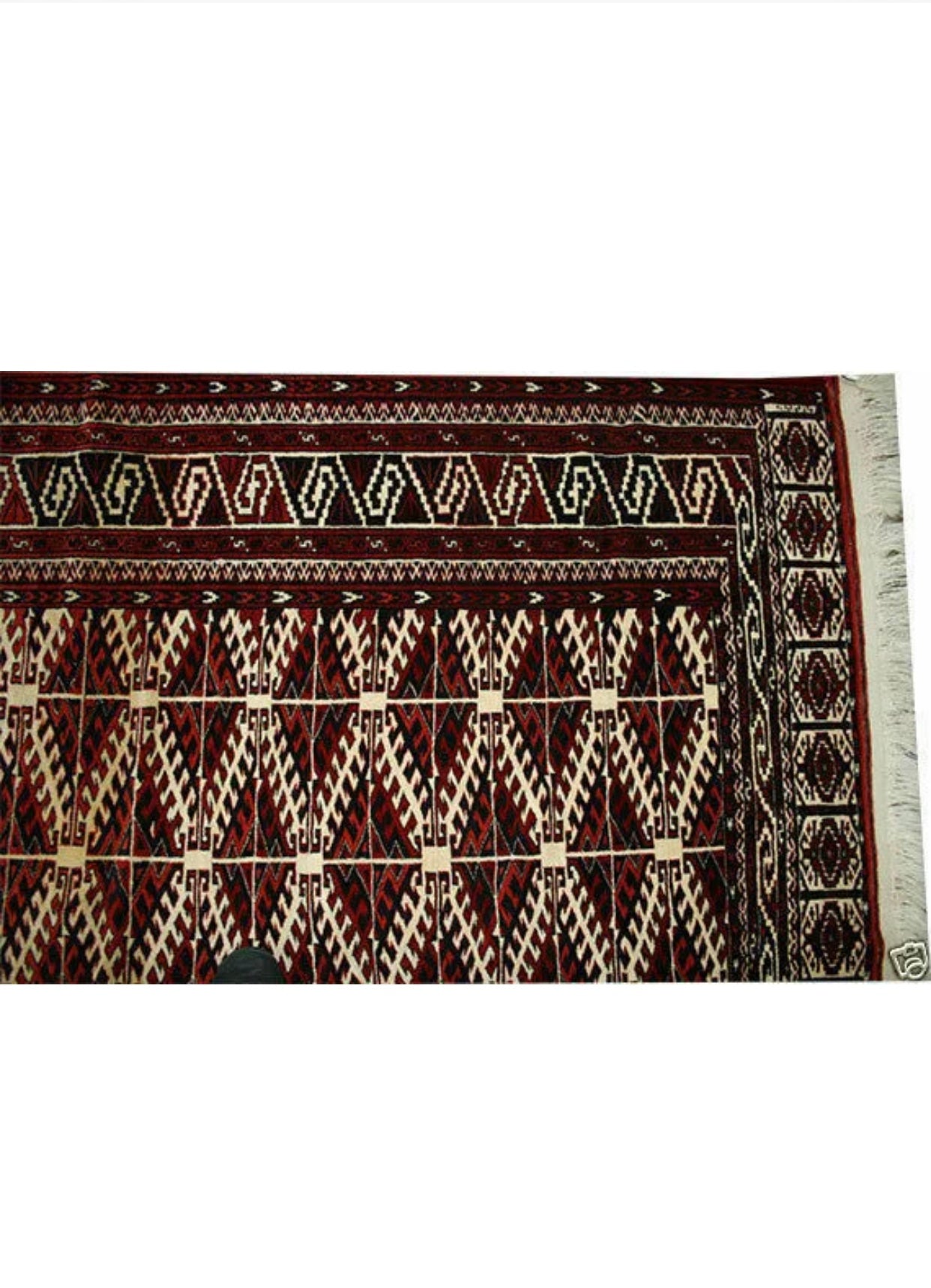 An Antique Tribal Turkoman Yamout Area Rug