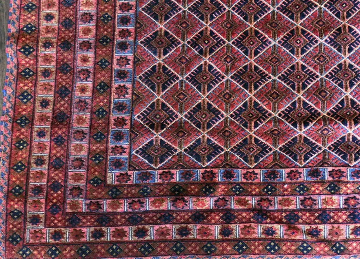 A Vintage Primitive & Tribal Geometric  Afghan Rug