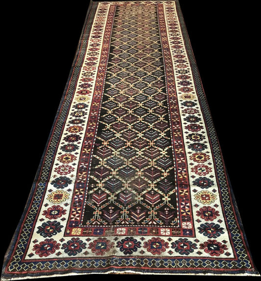An Antique 14’ Long Worn Out Caucasian Gallway Runner Rug