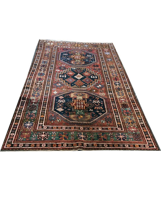 An Antique 3 Medallion Caucasian Kazak Rug