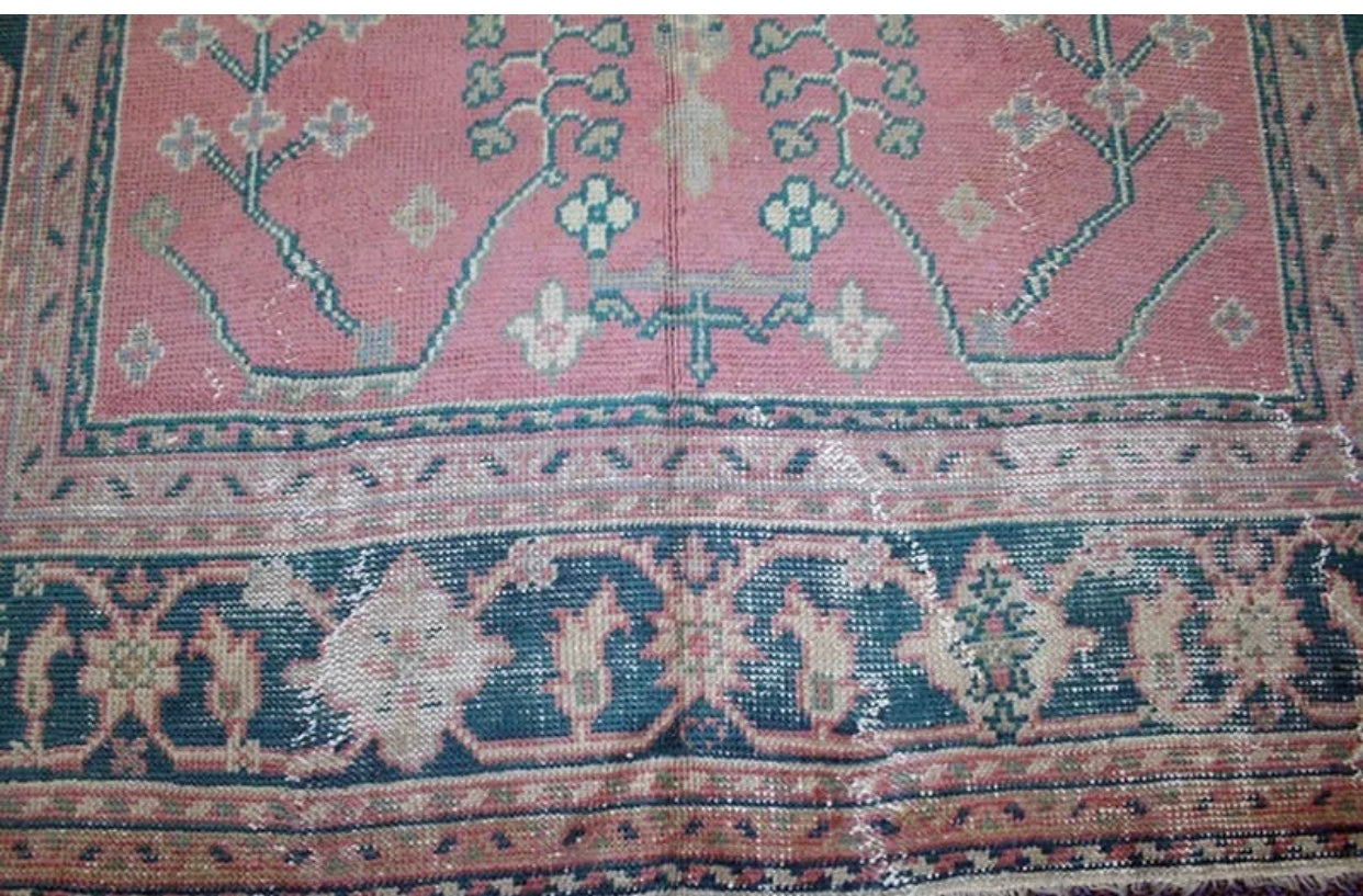 An Antique Worn Out Turkish Oushak Area Rug