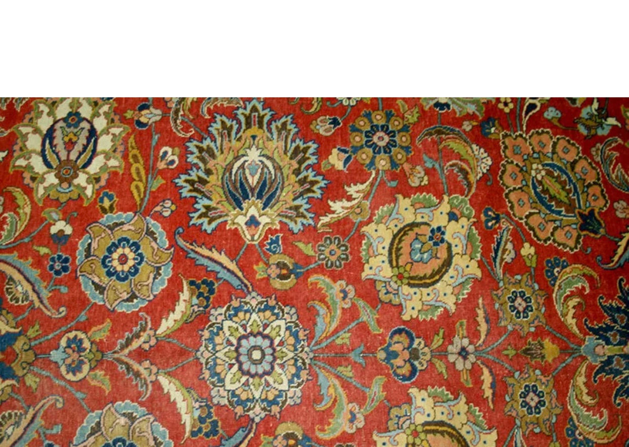 An Antique Decorative Persian Tabriz Rug