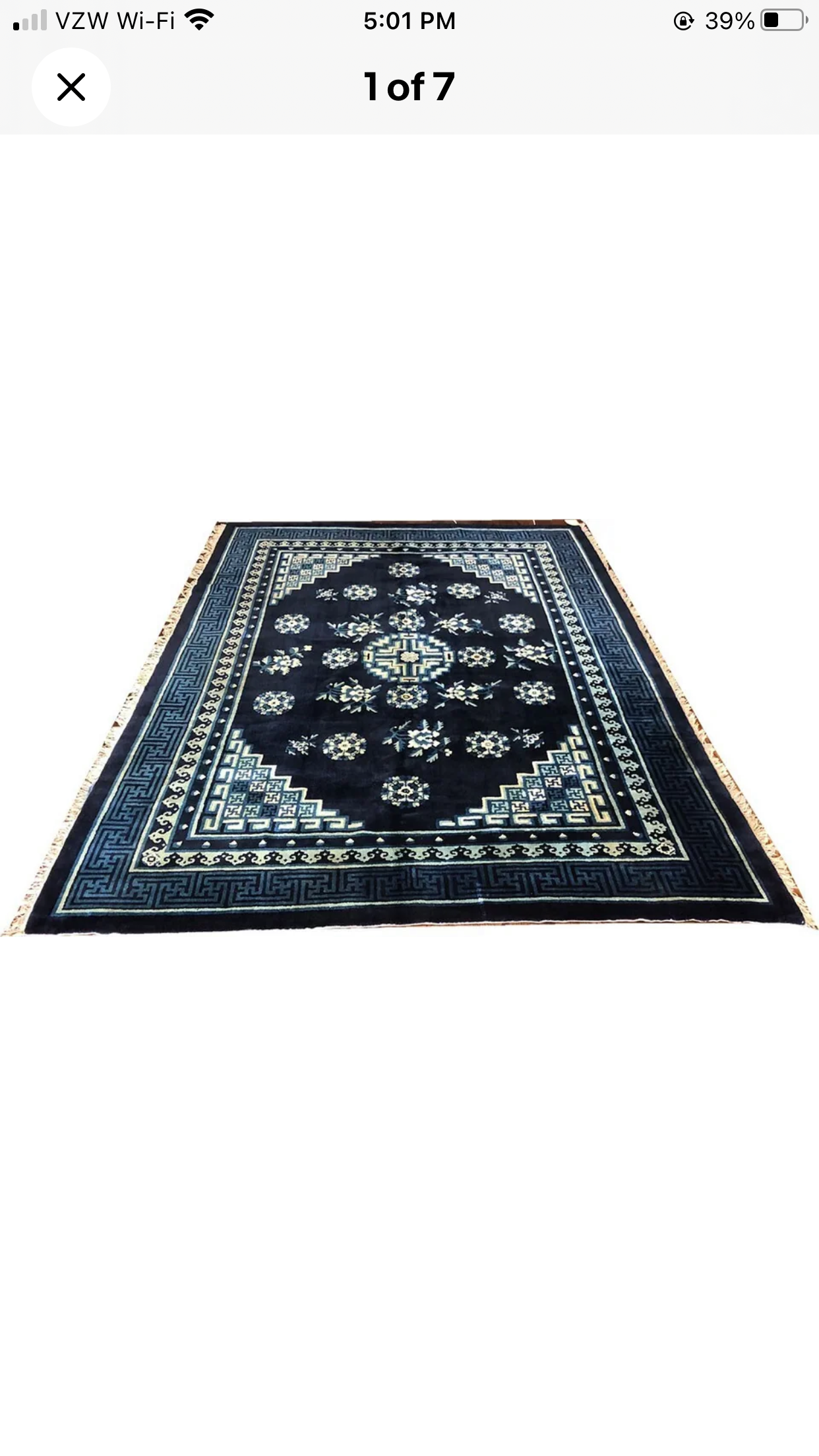 An Antique 6’ x 9’ Chinese Peking Rug “Pao Tao”