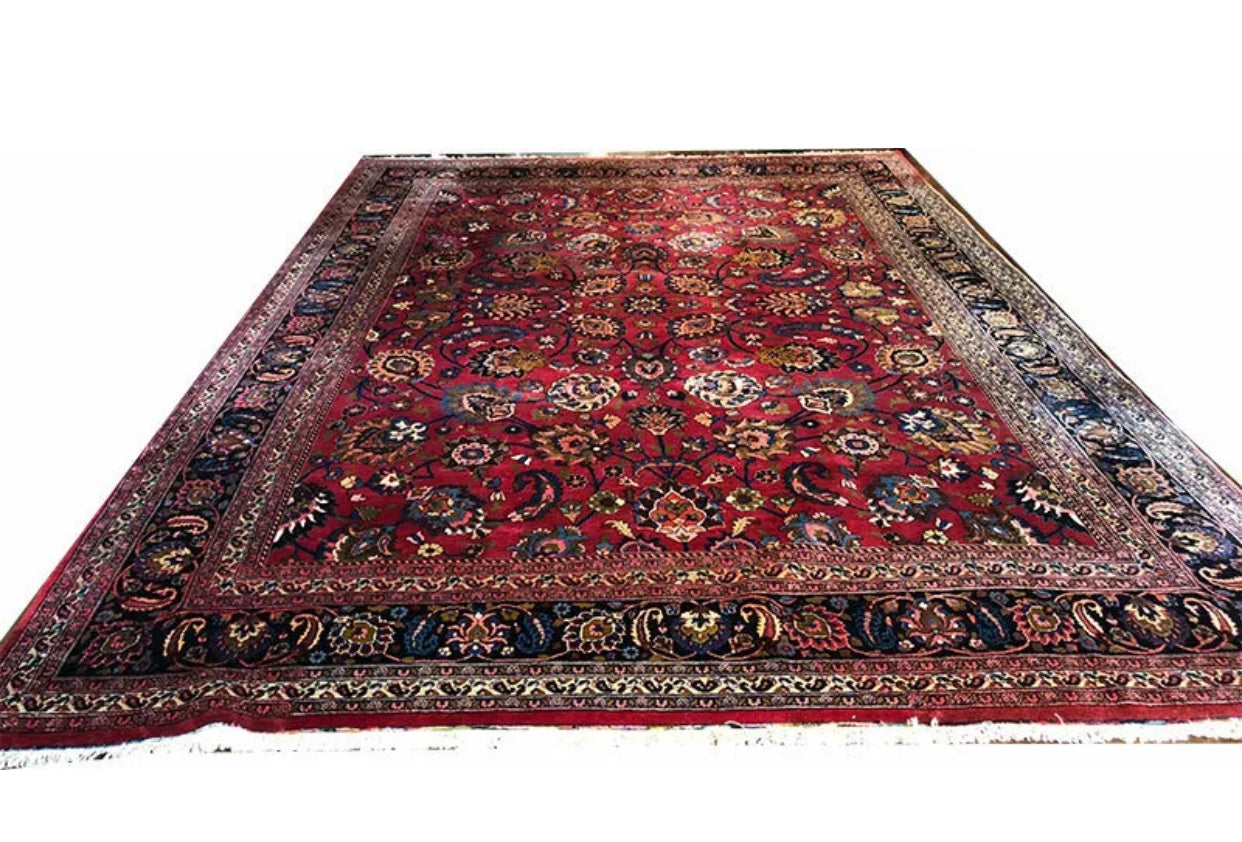 An Antique Palace Size Persian Mashad Rug