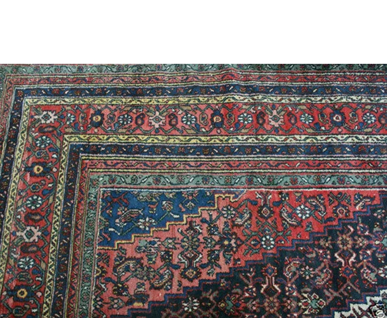 An Antique Palace Size 11’ x 19’ Persian Bibikabad Rug