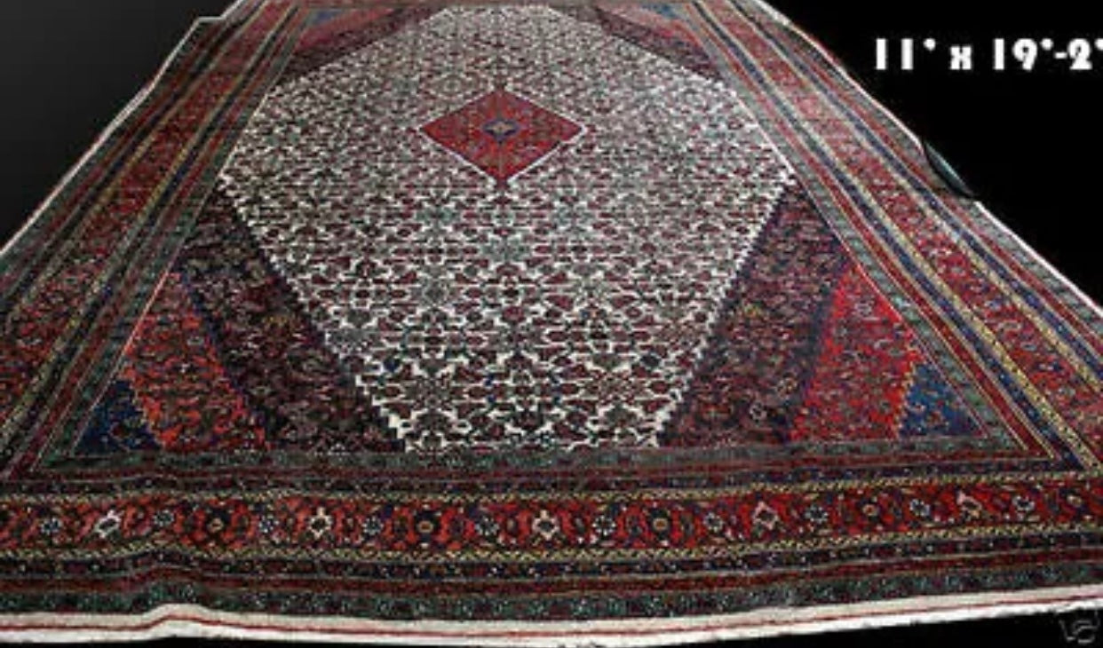 An Antique Palace Size 11’ x 19’ Persian Bibikabad Rug