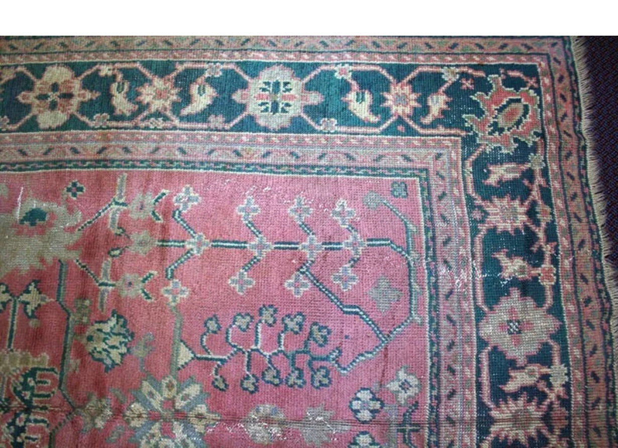 An Antique Worn Out Turkish Oushak Area Rug