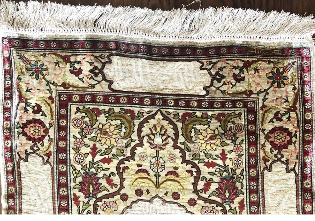 A Vintage Turkish Silk Hereke Rug With Metal Threds