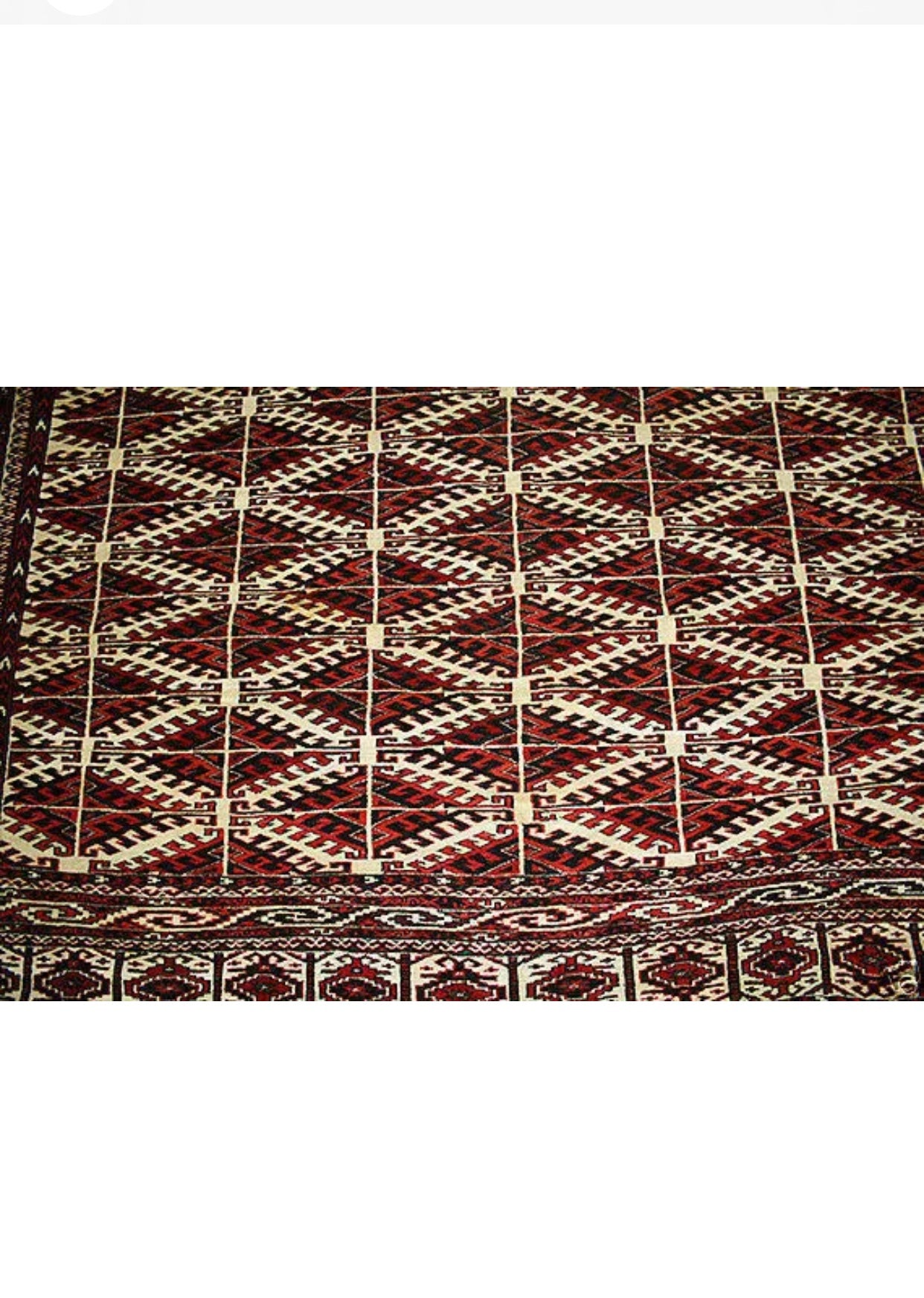 An Antique Tribal Turkoman Yamout Area Rug