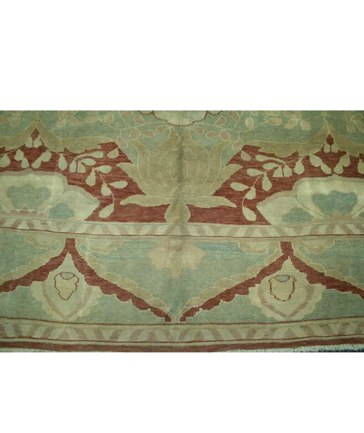 An Inspired Persian Ziegler Mahal Rug on an Egyptian Area Rug