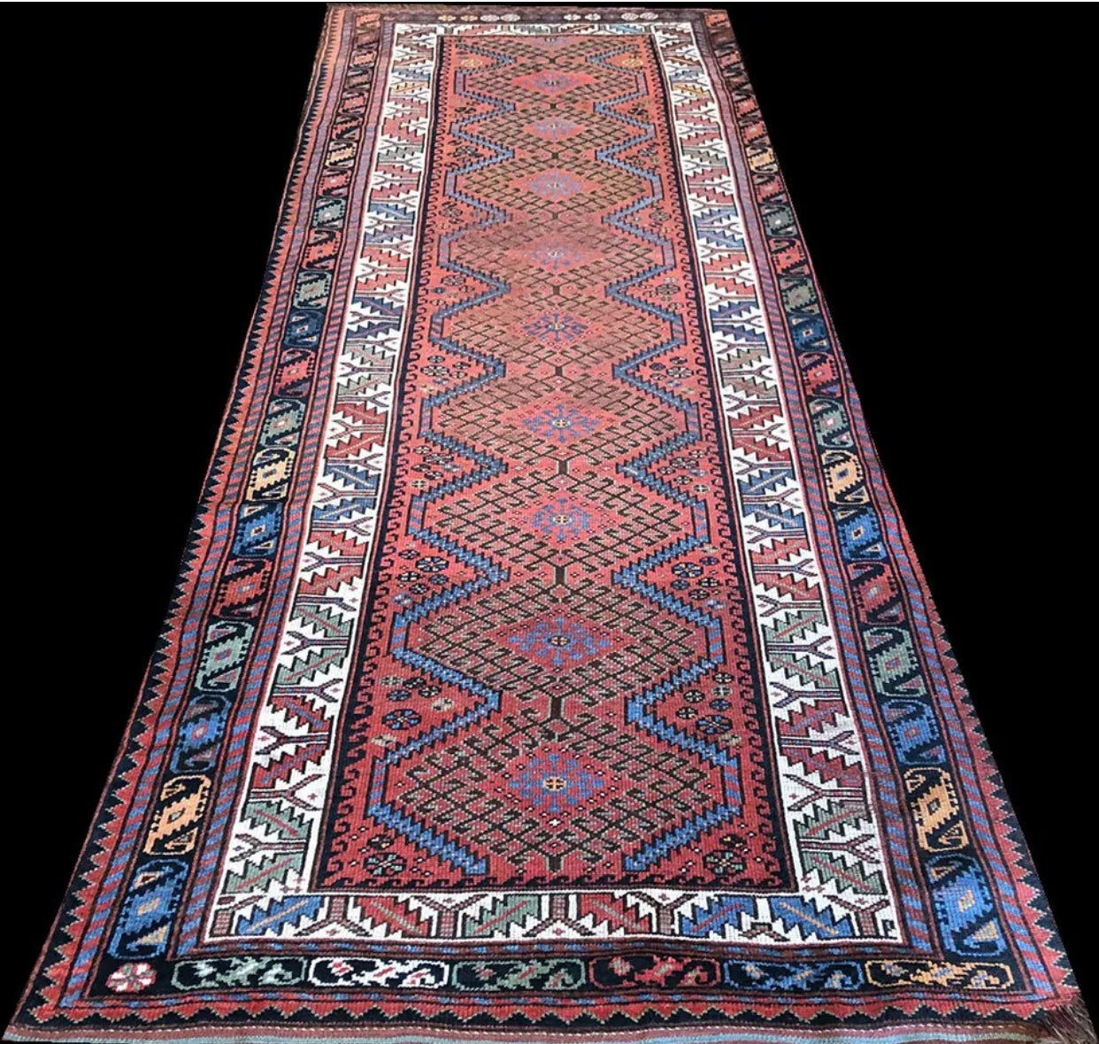 An Antique Tribal 4’x9’ Tribal Kurdish Runner/ Area Rug