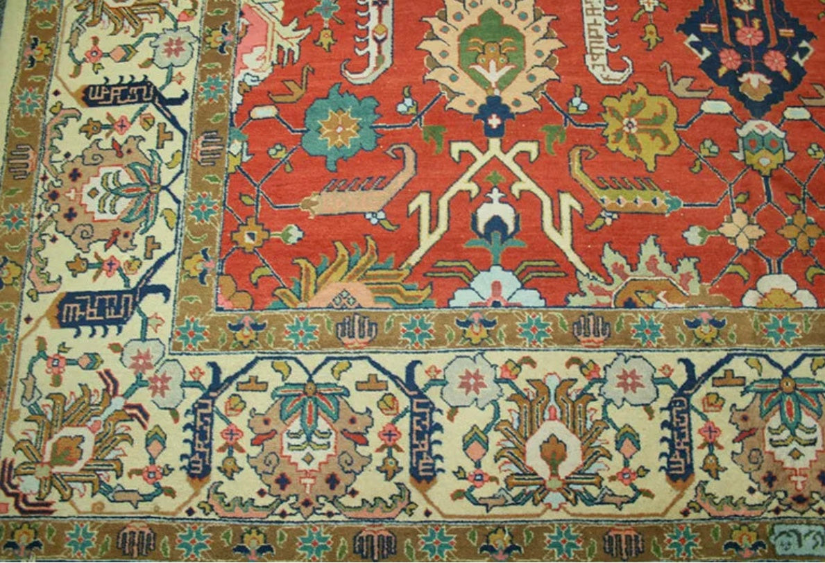 An Antique Signed Persian Tabriz rug