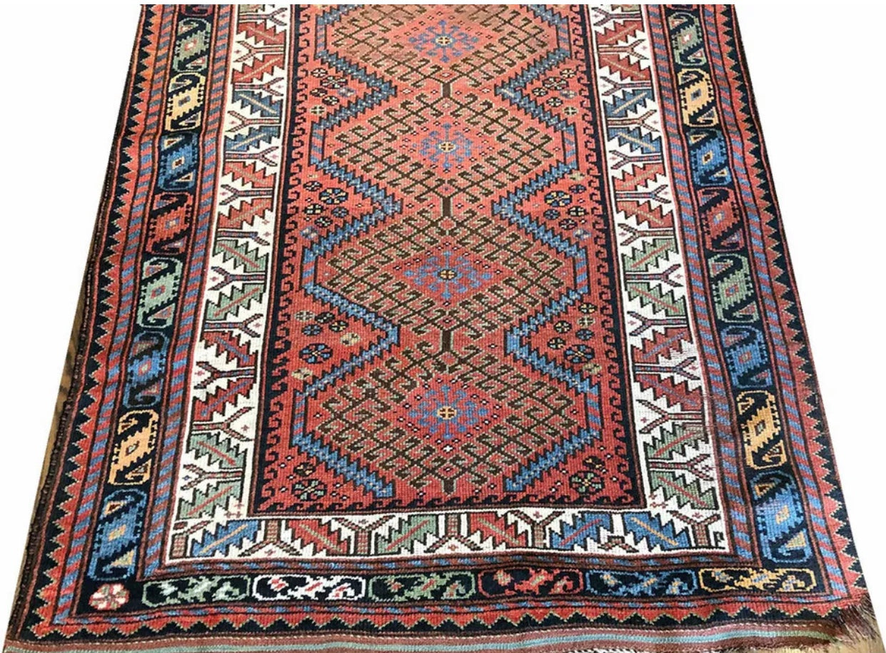 An Antique Tribal 4’x9’ Tribal Kurdish Runner/ Area Rug