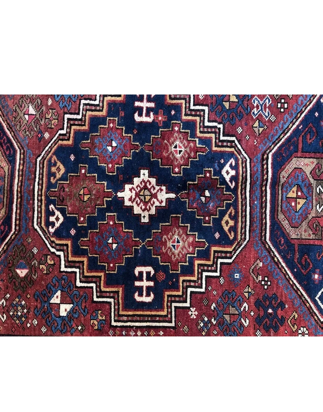 An Antique 3 Medallion Caucasian Kazak Rug