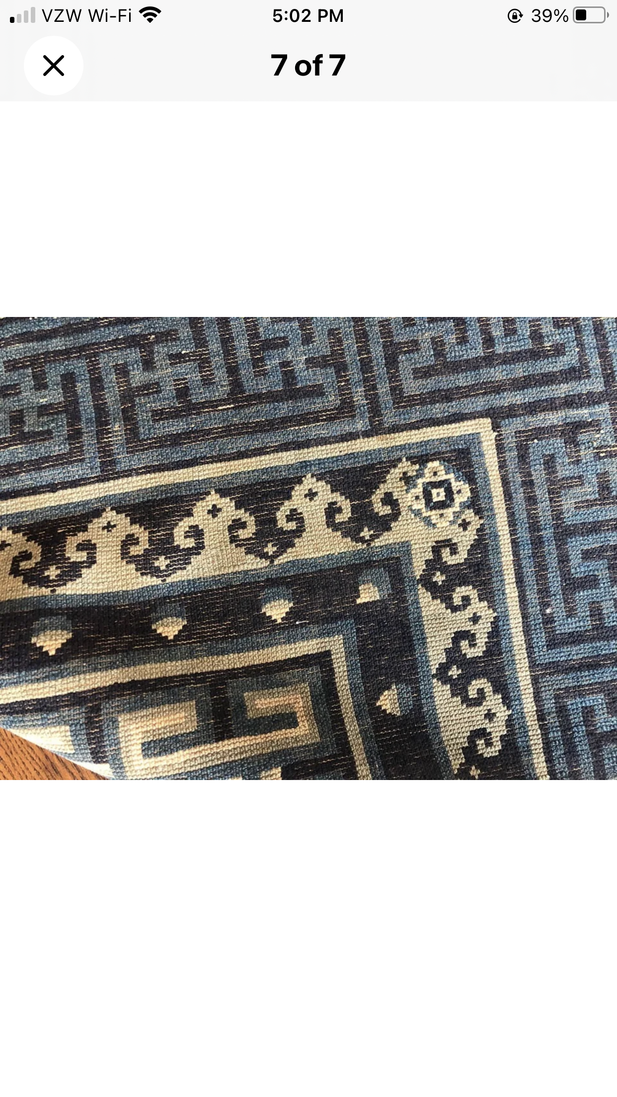 An Antique 6’ x 9’ Chinese Peking Rug “Pao Tao”