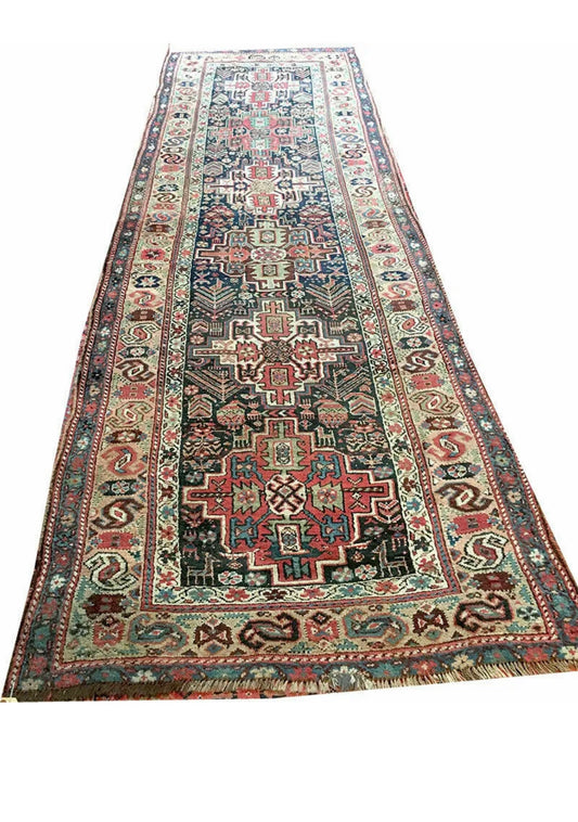 An Antique 12’ Long Persian tribal Kurdish Hallway Runner Rug