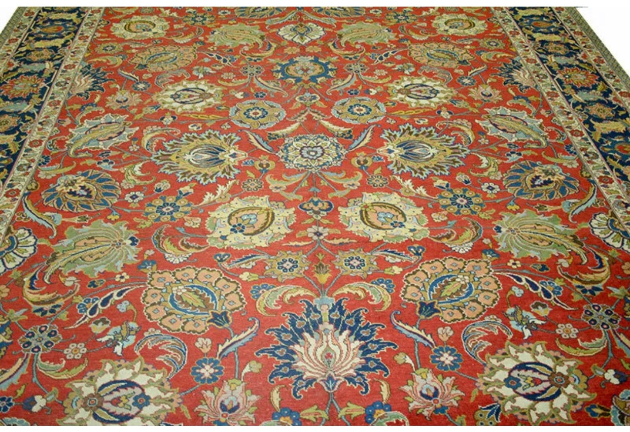 An Antique Decorative Persian Tabriz Rug