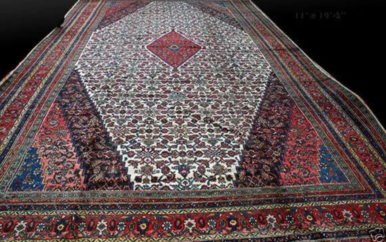 An Antique Palace Size 11’ x 19’ Persian Bibikabad Rug