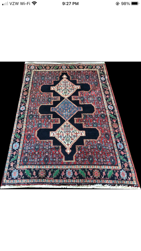 A Vintage Tribal Persian Seneh Rug