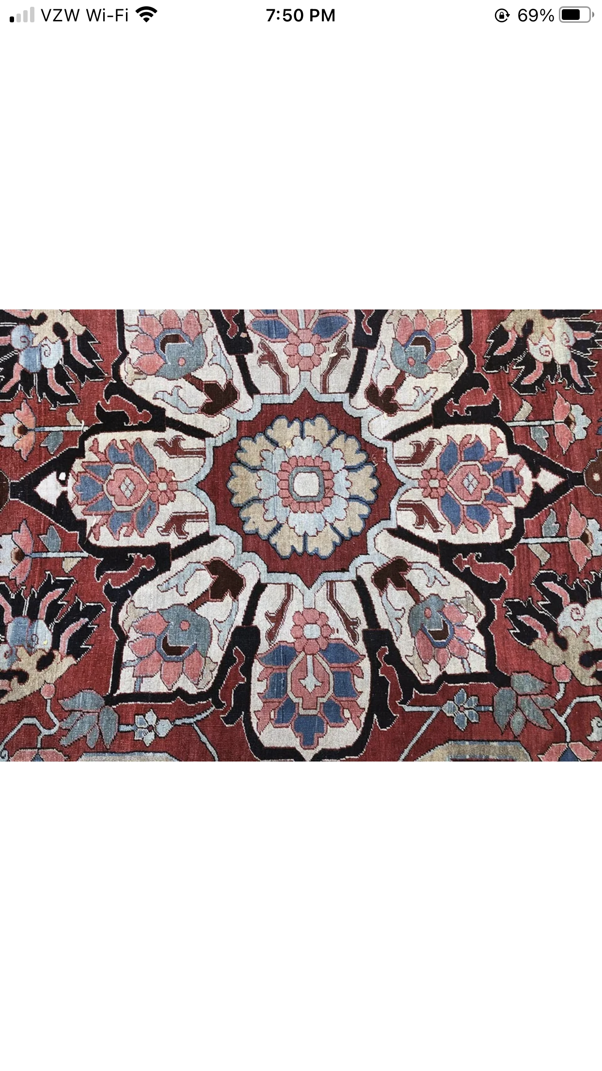 A Stunning Antique Persian Serapi Rug