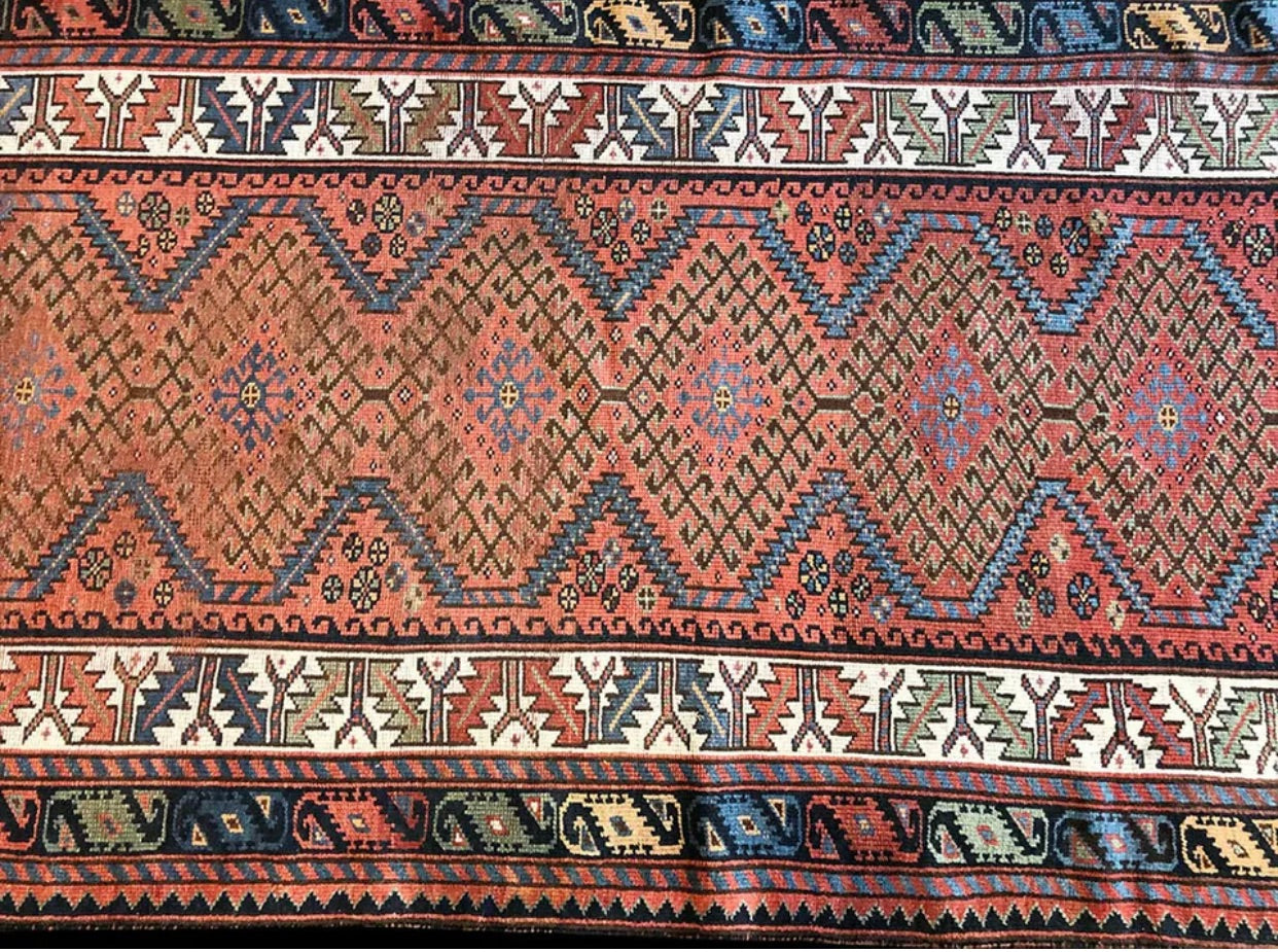 An Antique Tribal 4’x9’ Tribal Kurdish Runner/ Area Rug