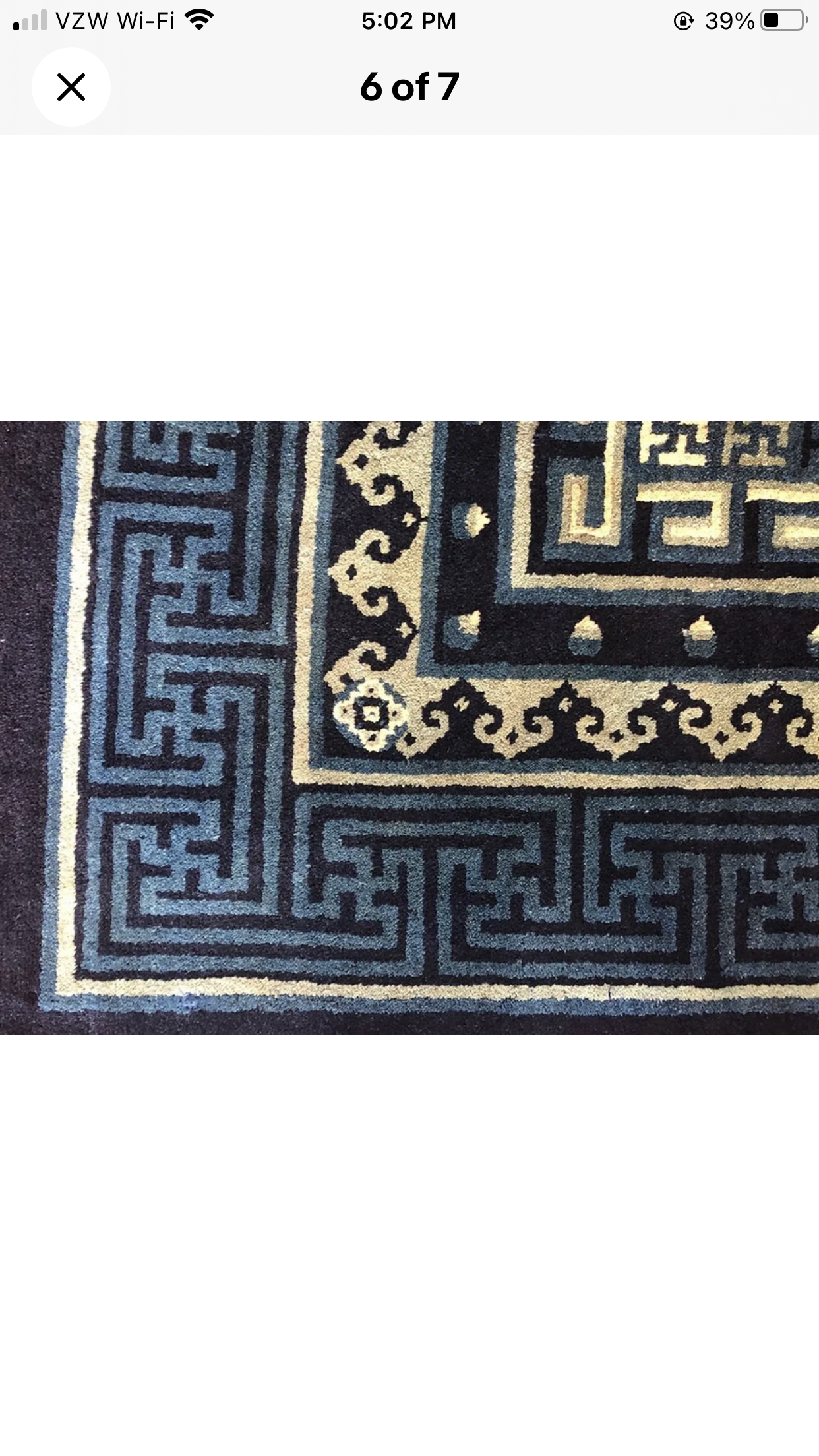 An Antique 6’ x 9’ Chinese Peking Rug “Pao Tao”