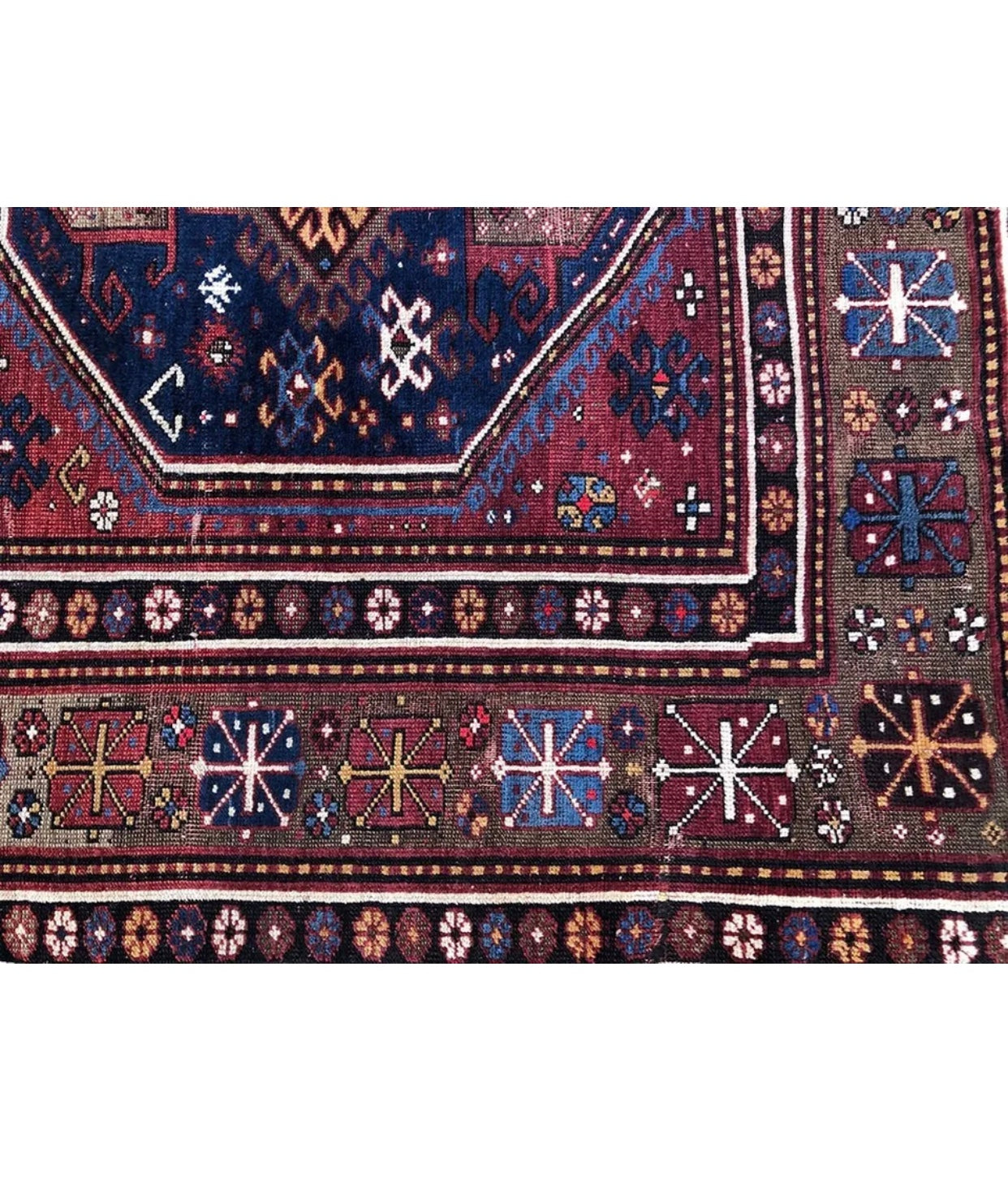An Antique 3 Medallion Caucasian Kazak Rug