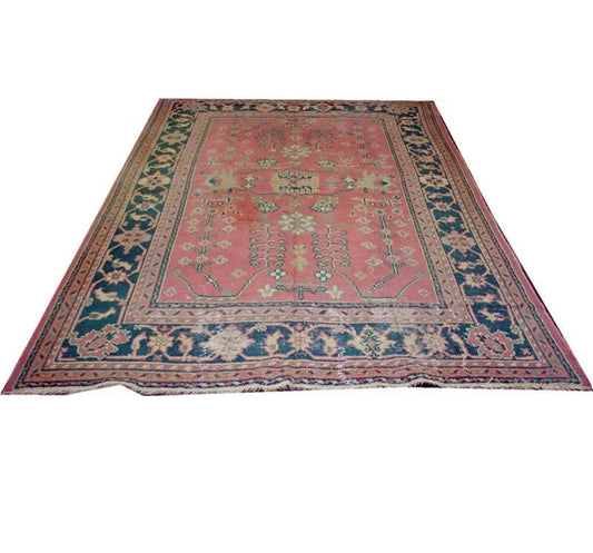 An Antique Worn Out Turkish Oushak Area Rug