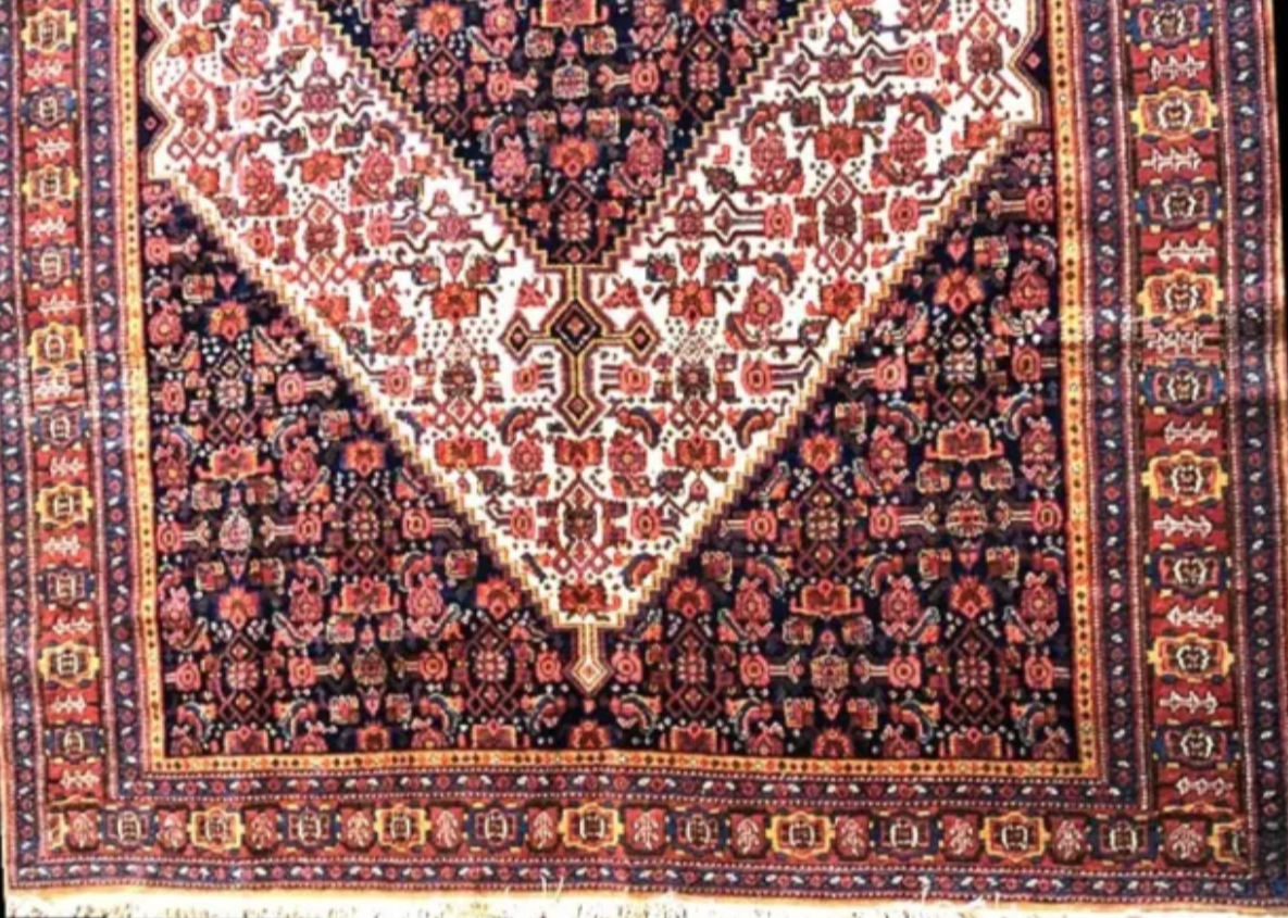A Brilliant Antique Tribal Persian Seneh Rug