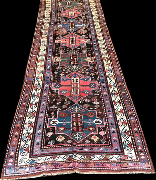 An Antique Caucasian Hallway Runner Rug