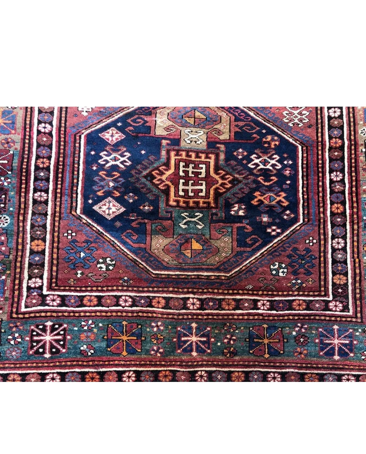 An Antique 3 Medallion Caucasian Kazak Rug