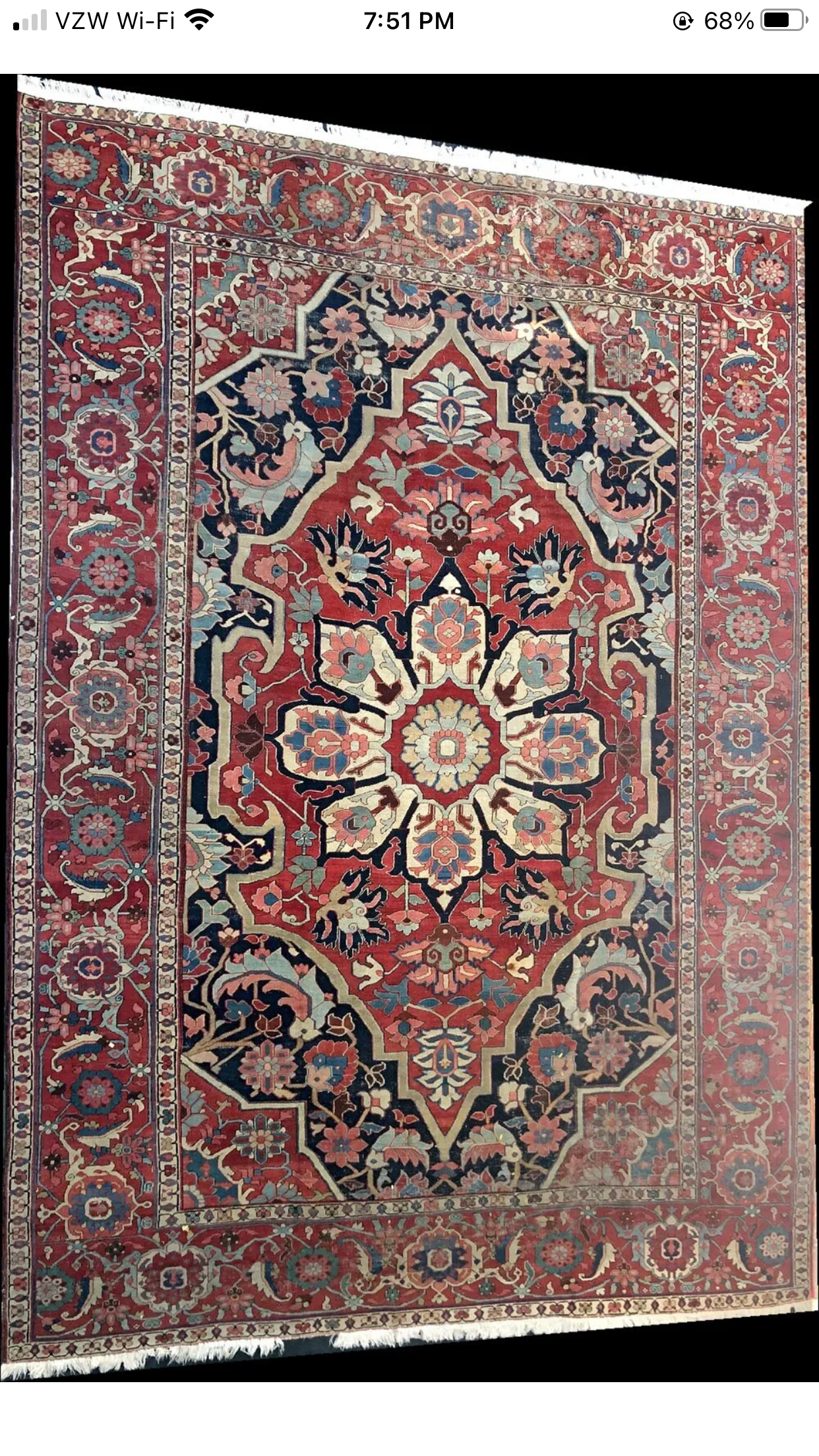 A Stunning Antique Persian Serapi Rug