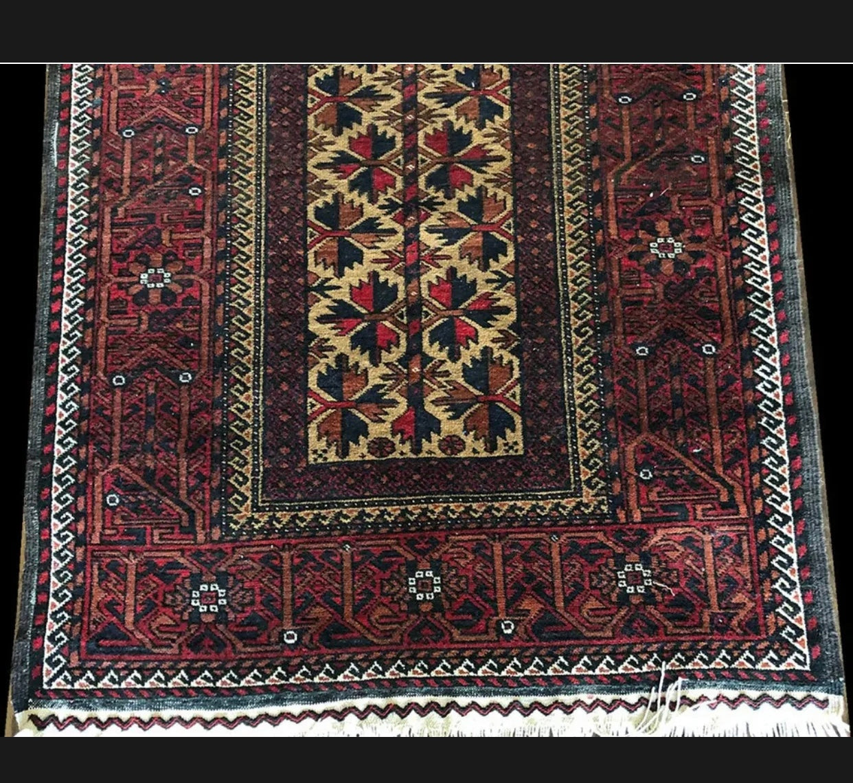 An Antique Primitive & Tribal Baluch Rug