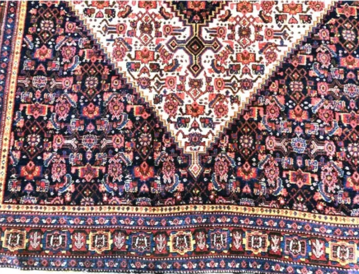 A Brilliant Antique Tribal Persian Seneh Rug