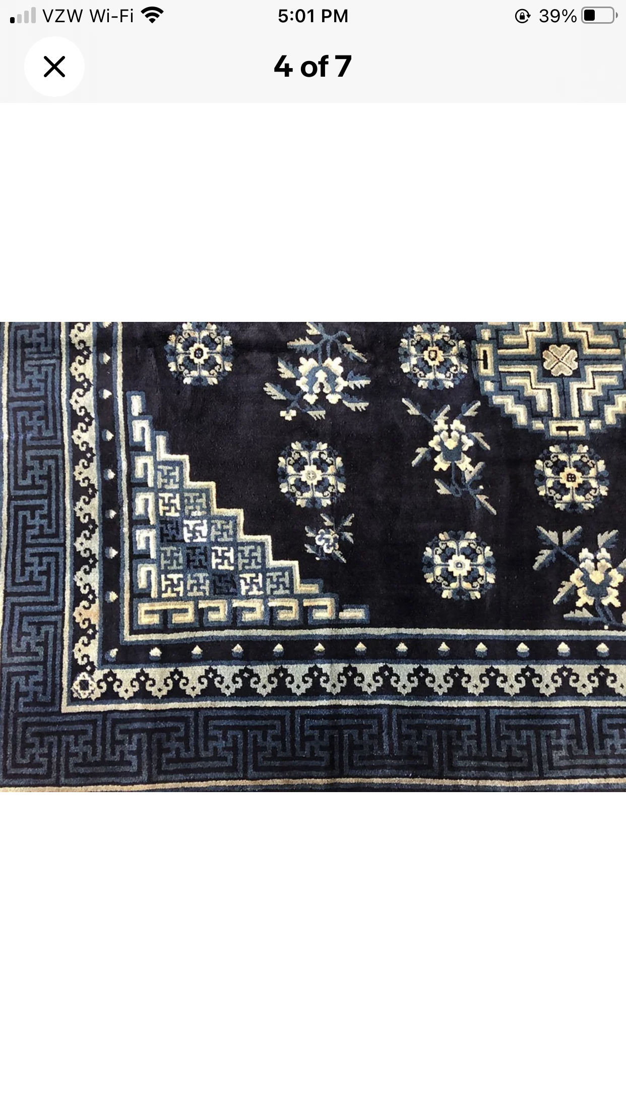 An Antique 6’ x 9’ Chinese Peking Rug “Pao Tao”