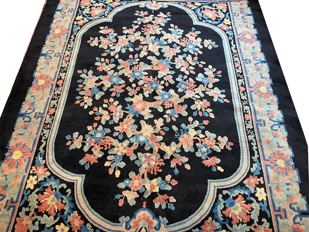 An Antique Black Bround 6'-4" x 9' Art Deco Chinese Rug