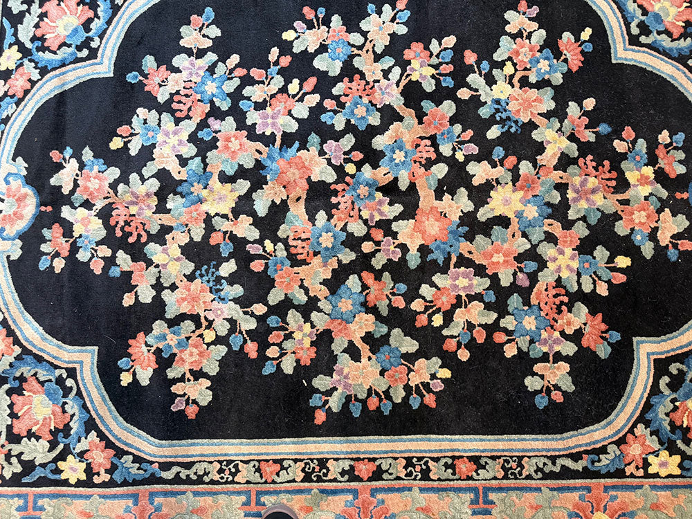 An Antique Black Bround 6'-4" x 9' Art Deco Chinese Rug
