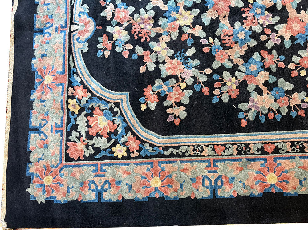 An Antique Black Bround 6'-4" x 9' Art Deco Chinese Rug