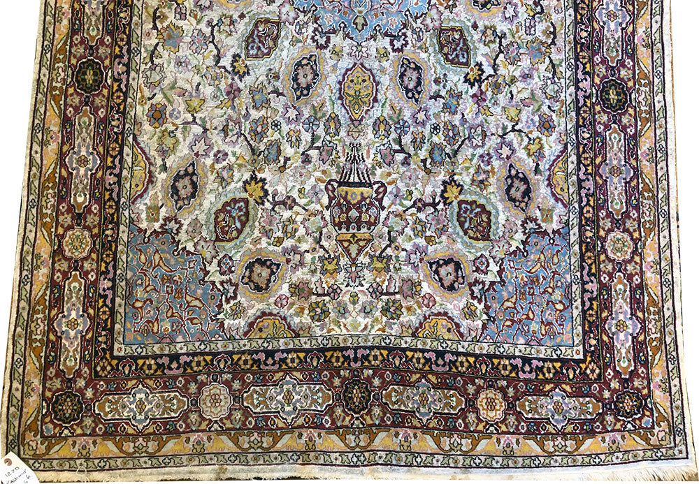 A Vintage 4' x 6'-6" Silk Ground Genuine Kashmir Rug