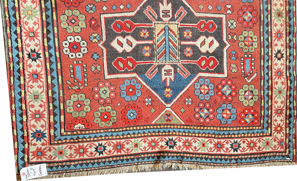 An Antique Decorative Geometric Tribal Caucasian Rug