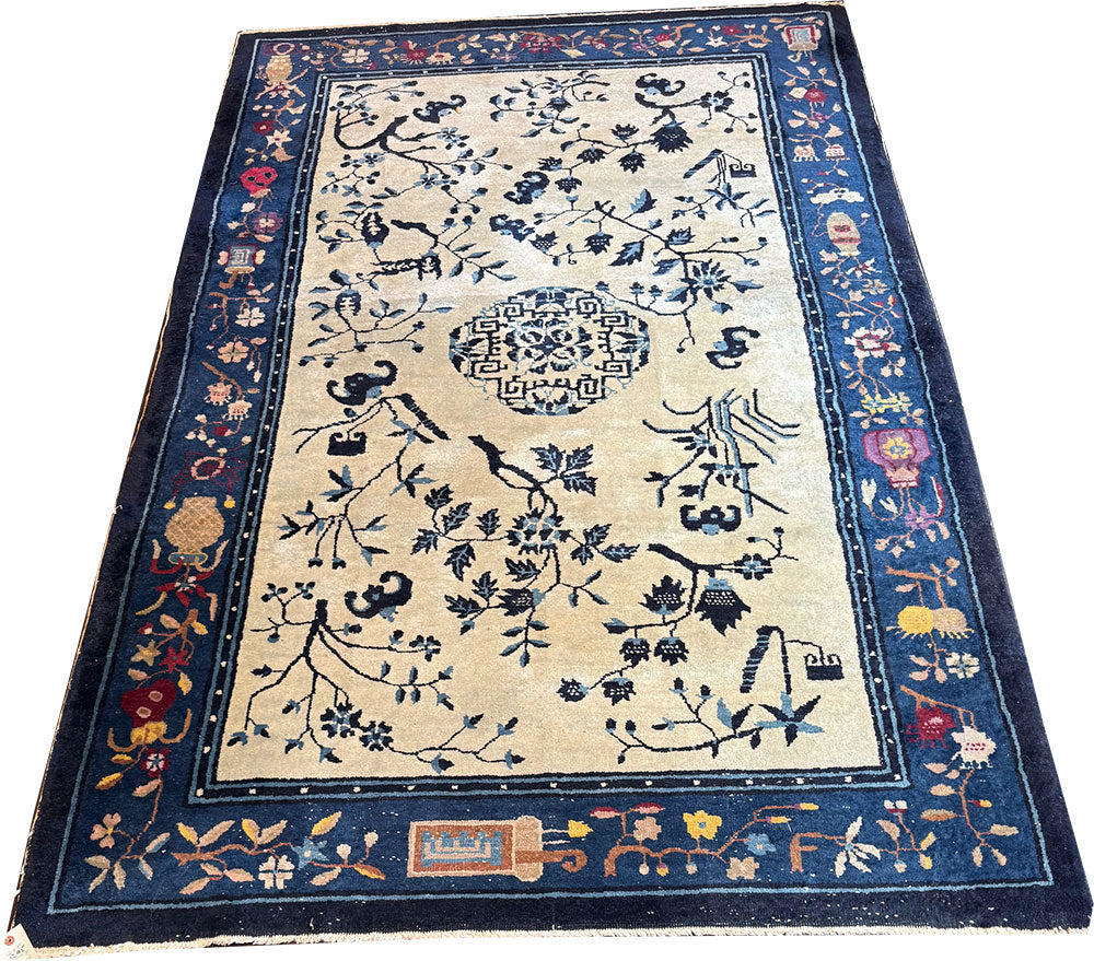 An Antique 5' x 8' Unusual Chinese Peking Rug
